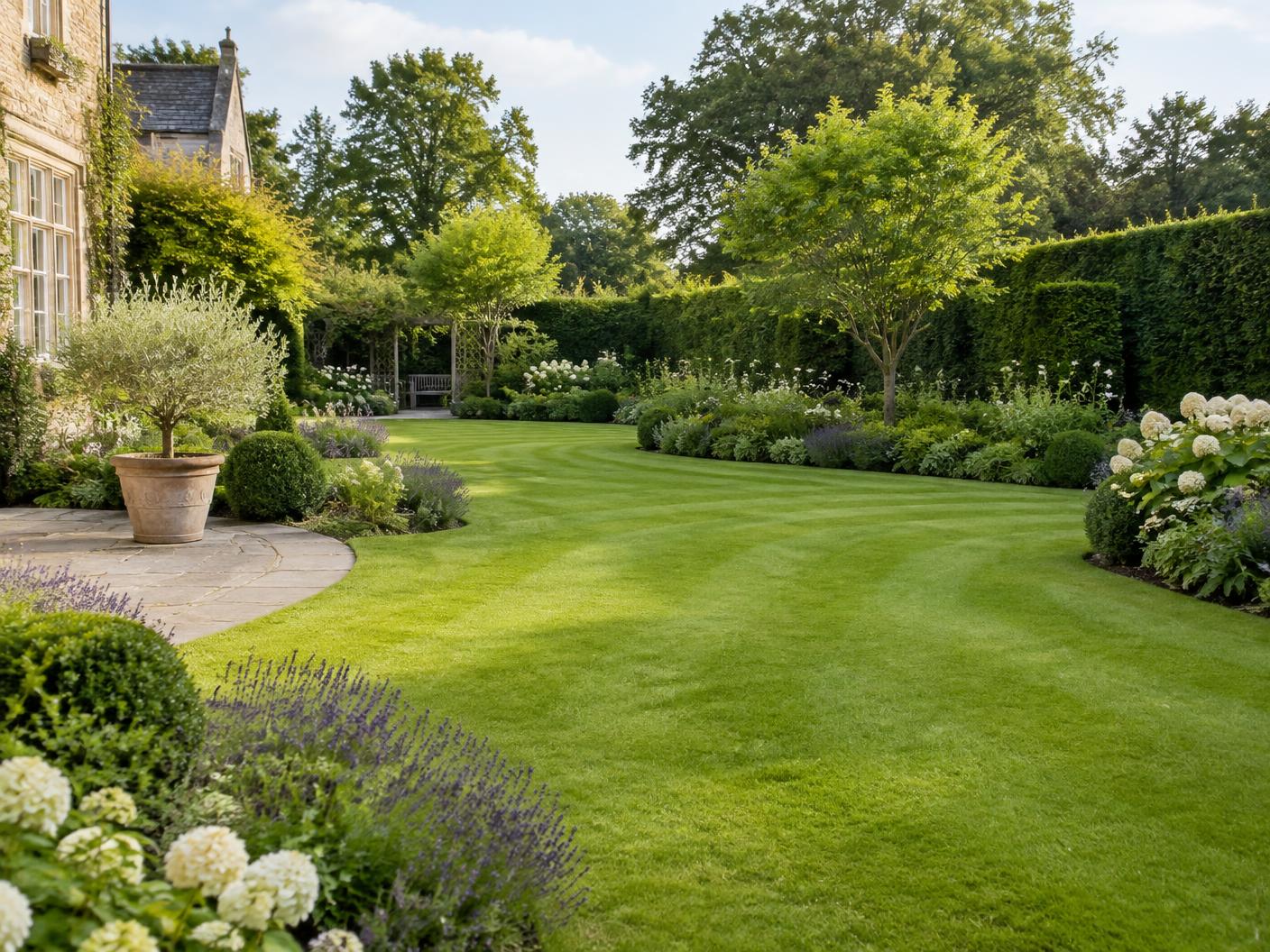 Landscaped garden with a generous lawn and structured borders